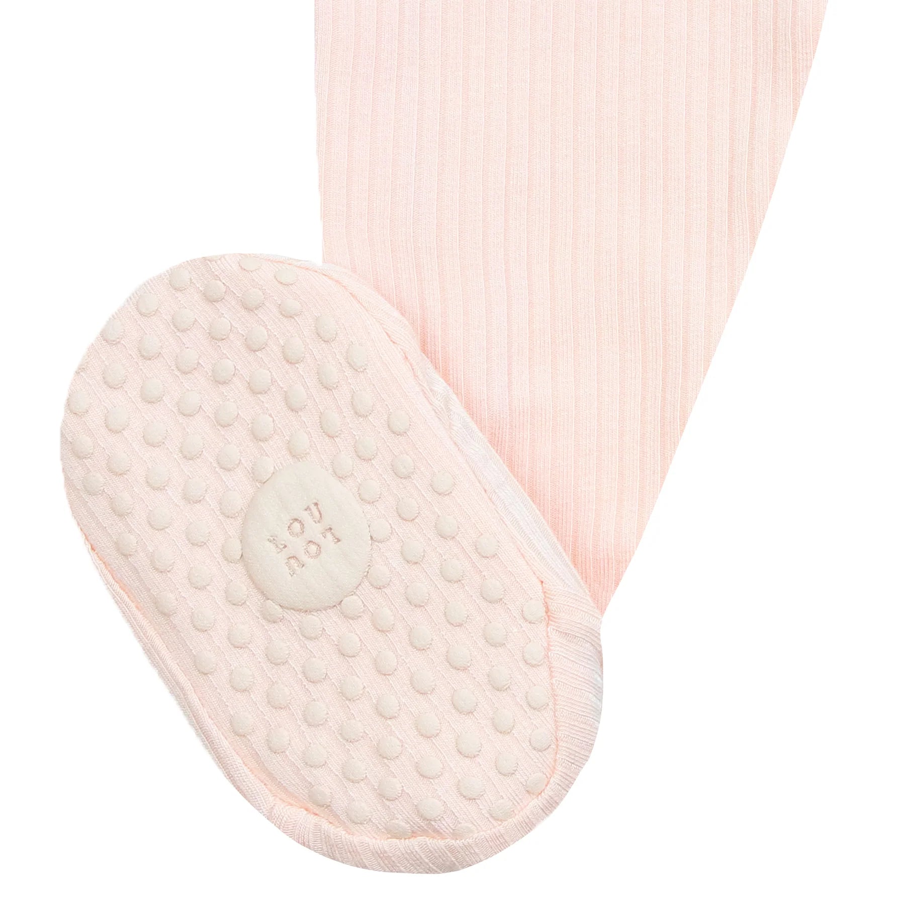 Close-up of the non-slip grip sole on the Lou Lou & Company Zipper Footies in Rosie