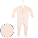 Lou Lou & Company Zipper Footies in Rosie, a light pink ribbed baby footie with a front zipper, on a hanger with a fabric swatch
