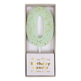 Meri Meri Colored Number Candle 0 in mint green shown in its Birthday Candle box