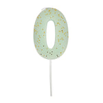 Meri Meri Colored Number Candle 0, a mint green birthday candle with gold glitter flecks