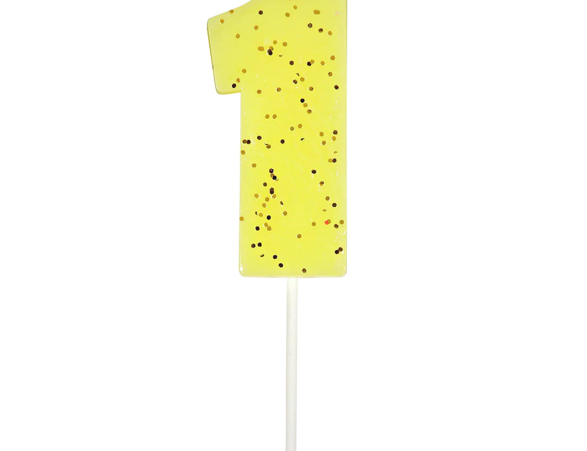 Meri Meri Colored Number Candle 1, a neon yellow birthday candle with gold glitter flecks