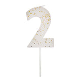 Meri Meri Colored Number Candle 2, a white birthday candle with gold glitter flecks