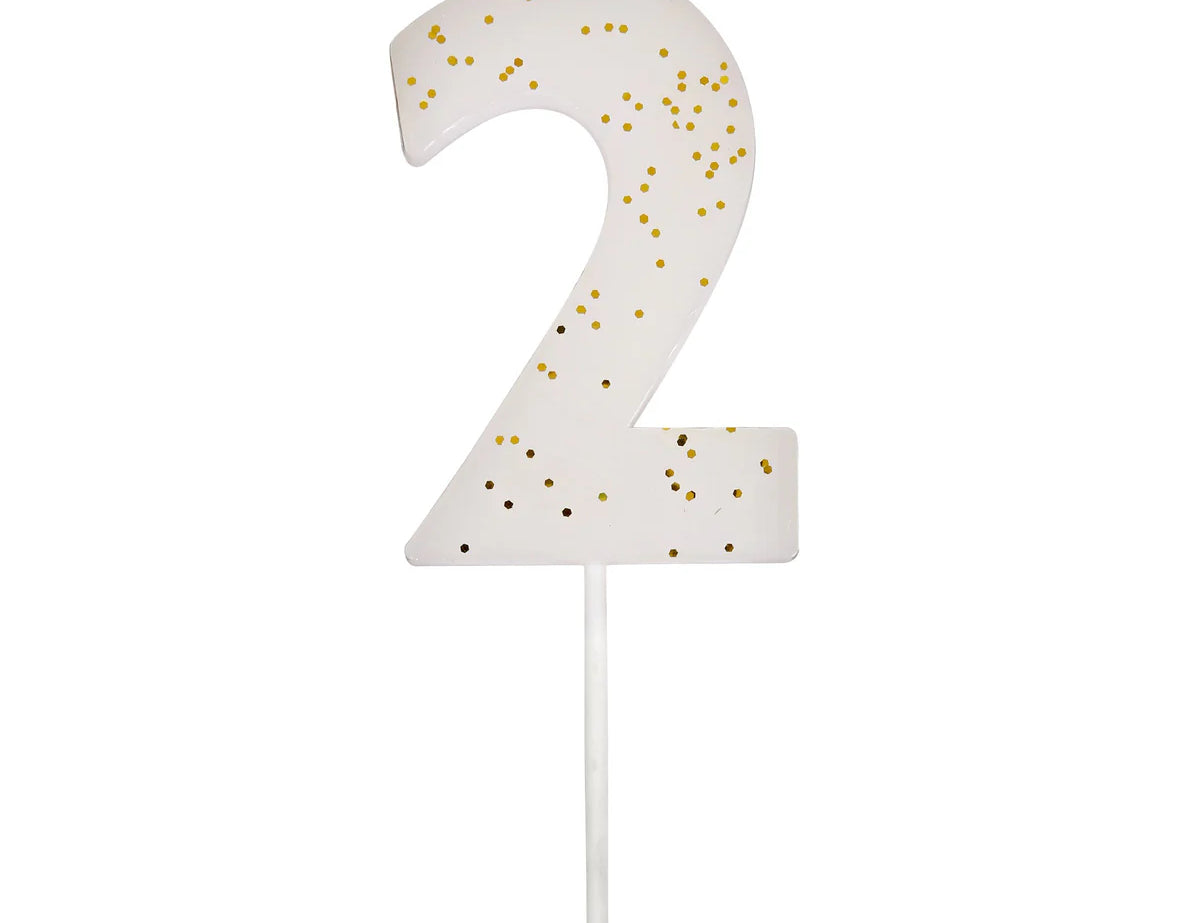 Meri Meri Colored Number Candle 2, a white birthday candle with gold glitter flecks