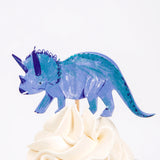 Meri Meri Dinosaur Kingdom Cupcake Kit blue triceratops topper on a frosted cupcake