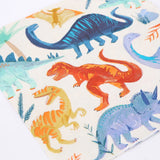 Close-up of the painted T-rex and brachiosaurus print on the Meri Meri Dinosaur Kingdom Large Napkins