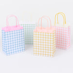 Meri Meri Gingham Fringe Party Bags in blue, yellow and pink gingham with fringe trim and twisted handles