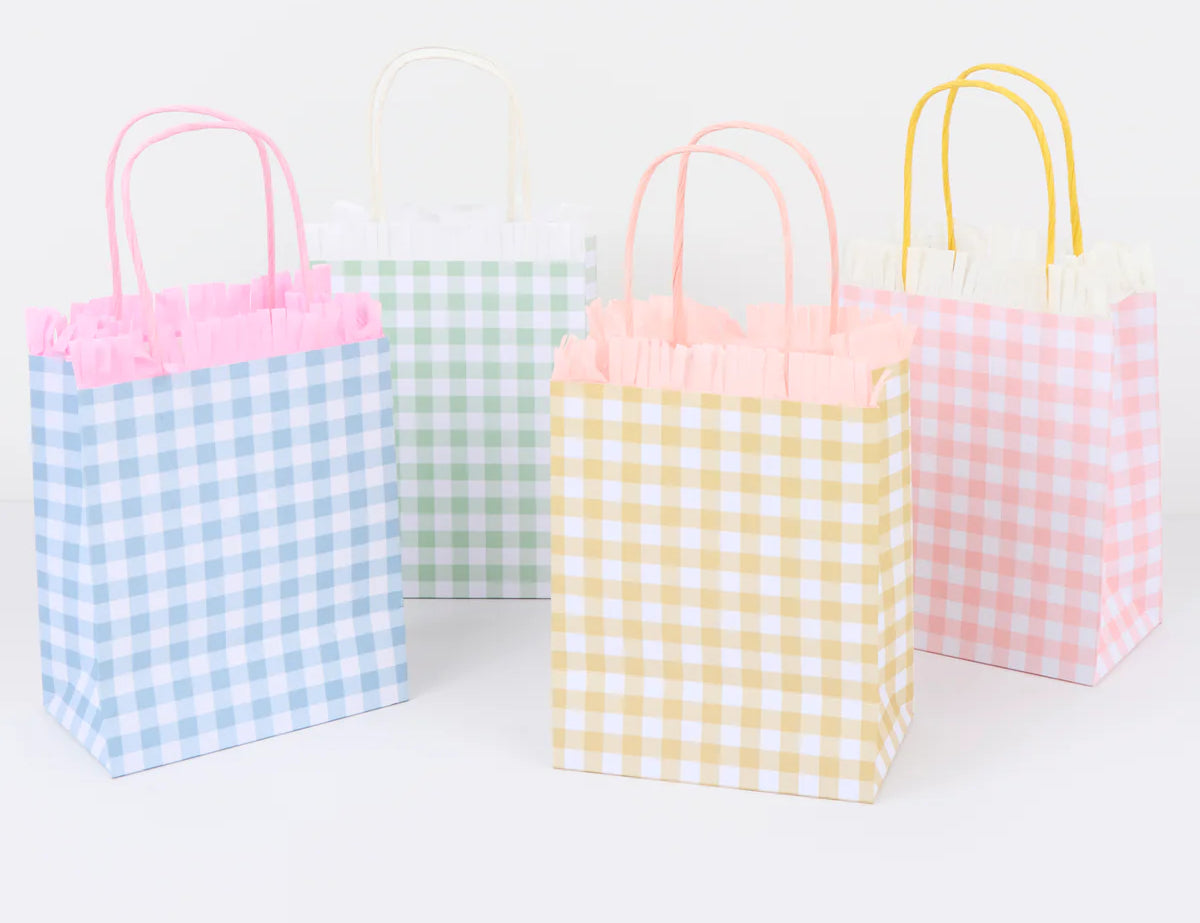 Meri Meri Gingham Fringe Party Bags in blue, yellow and pink gingham with fringe trim and twisted handles