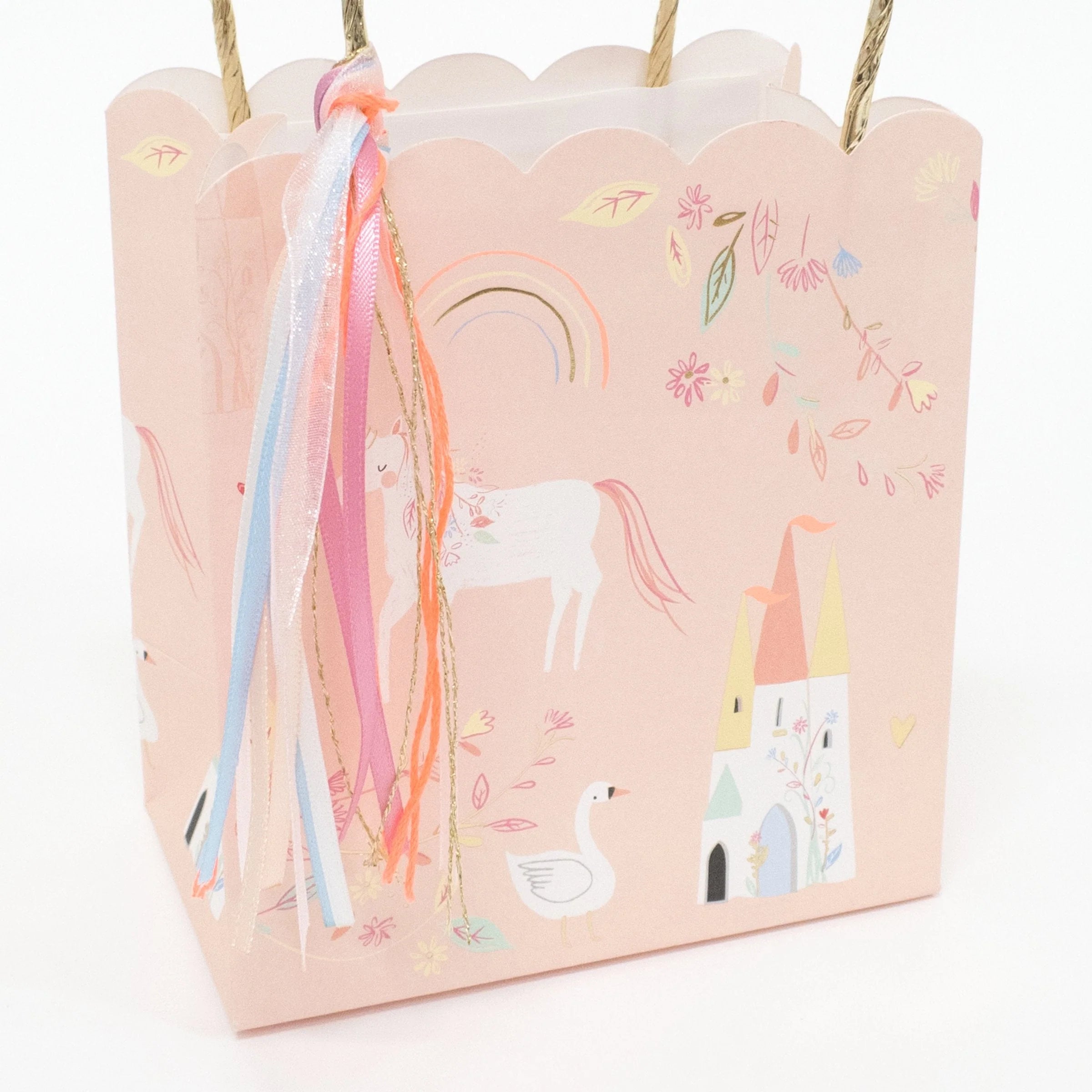 Close-up of the unicorn, castle and rainbow print on the Meri Meri Princess Party Bag