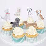 Meri Meri Puppy Cupcake Kit cupcakes on a cake stand with dog toppers in blue wrappers