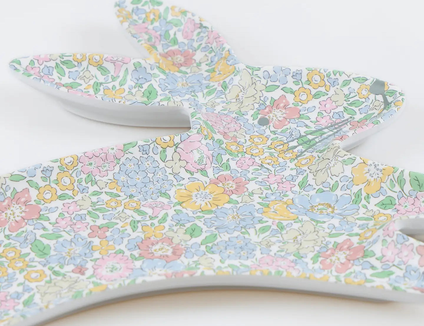 Meri Meri Reusable Bunny Plates in pastel floral stacked on a white surface