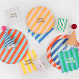 Meri Meri Stripe Happy Birthday Large Napkins styled with striped plates, party hats and cups