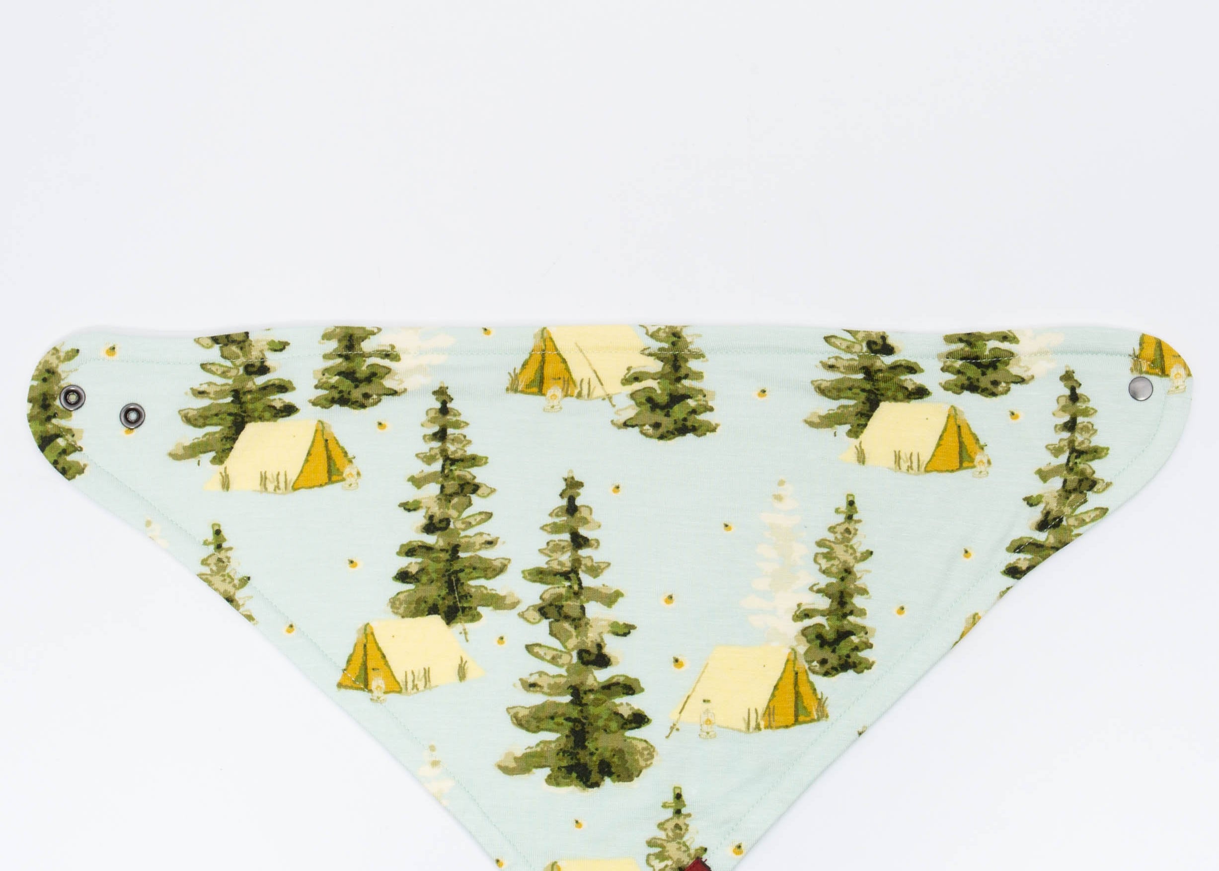 Milkbarn Camping Three-Layer Kerchief Bib, a light blue bandana bib with a pine tree and tent print