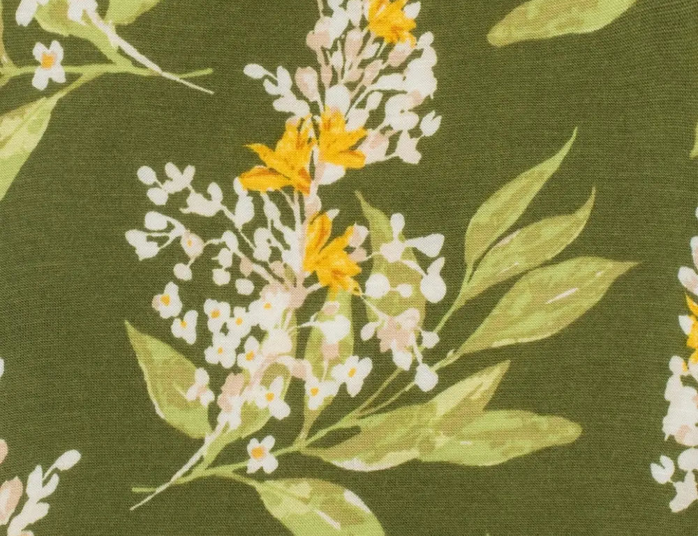 Close-up of the floral print on the Milkbarn Green Floral Ruffle Bloomer