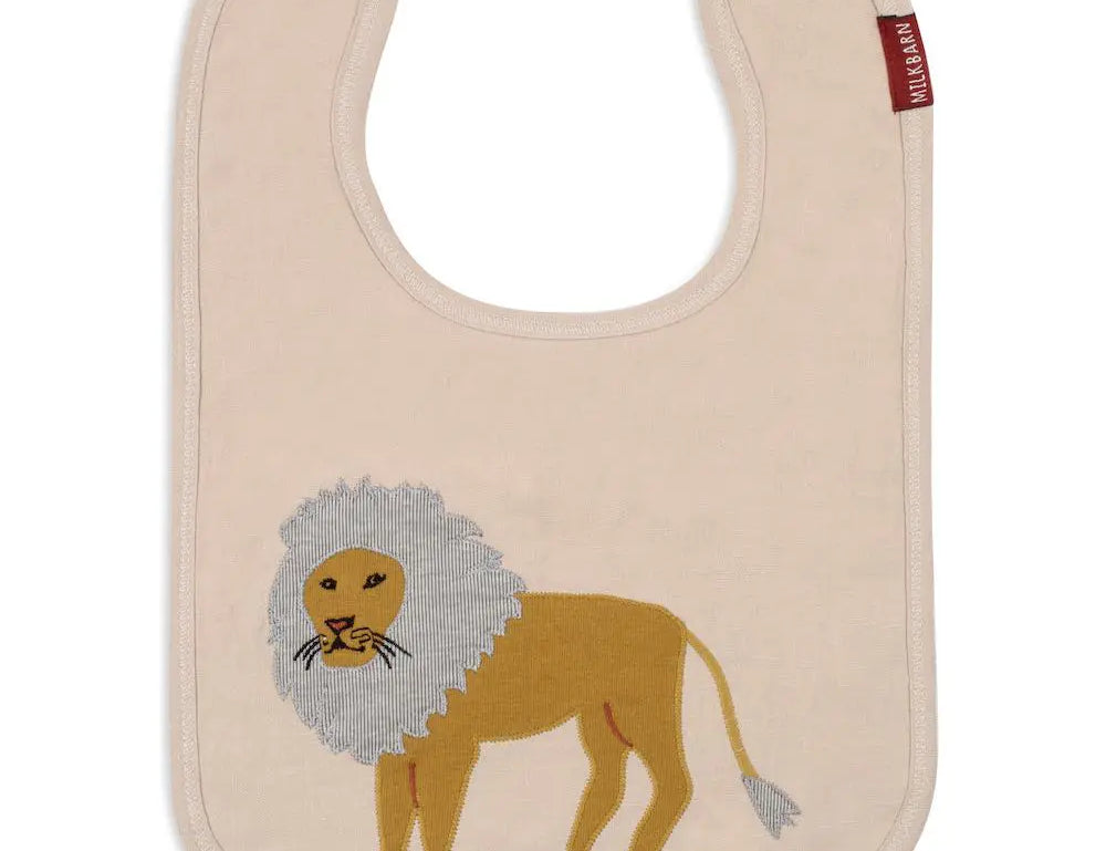 Milkbarn Lion Linen Two-Layer Bib, a cream linen bib with an appliqued mustard lion