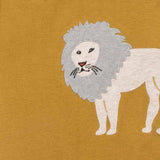 Close-up of the cream lion applique on the Milkbarn Lion Short Sleeve One Piece in mustard