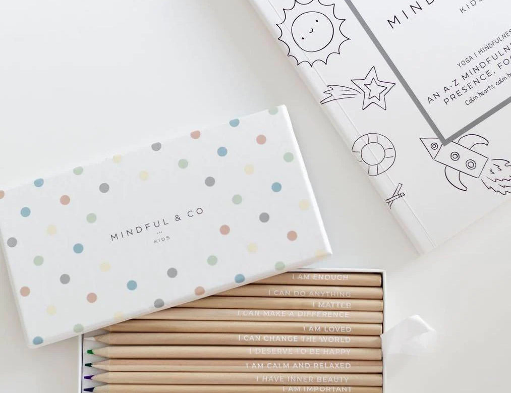 Mindful & Co Affirmation Coloring Pencils, natural wood pencils with printed affirmations in a polka dot box with a coloring page