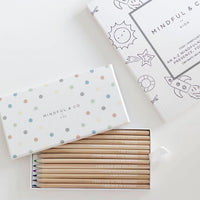 Mindful & Co Affirmation Coloring Pencils, natural wood pencils with printed affirmations in a polka dot box with a coloring page