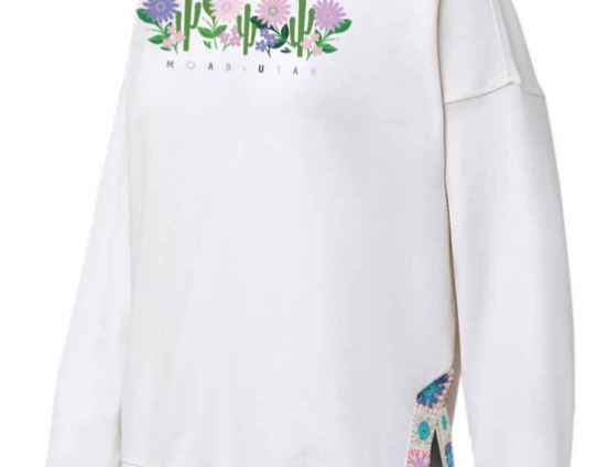 Crystal white Moab hoodie with a row of cacti and desert wildflowers over Moab Utah