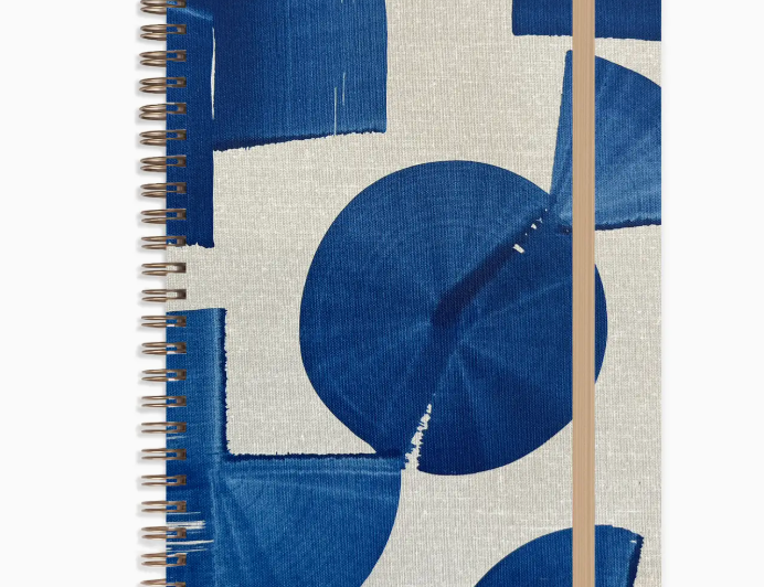 Moglea Indigo Medium A5 Notebook, a spiral notebook with a hand-painted indigo blue geometric cover