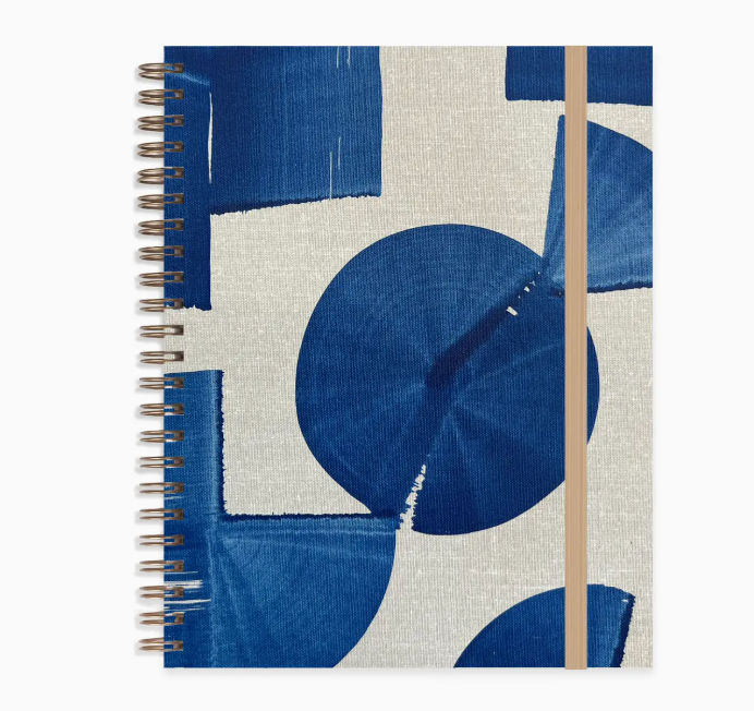 Moglea Indigo Medium A5 Notebook, a spiral notebook with a hand-painted indigo blue geometric cover