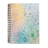 Moglea Painted Mystic Journal, a spiral notebook with a pastel splatter-painted cover