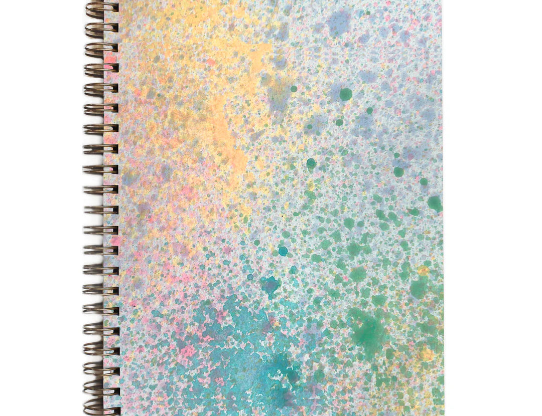 Moglea Painted Mystic Journal, a spiral notebook with a pastel splatter-painted cover