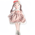 Mon Ami Boho Princess Doll in Ruthie, a light-skinned doll with braids in a blush dress and beaded headband