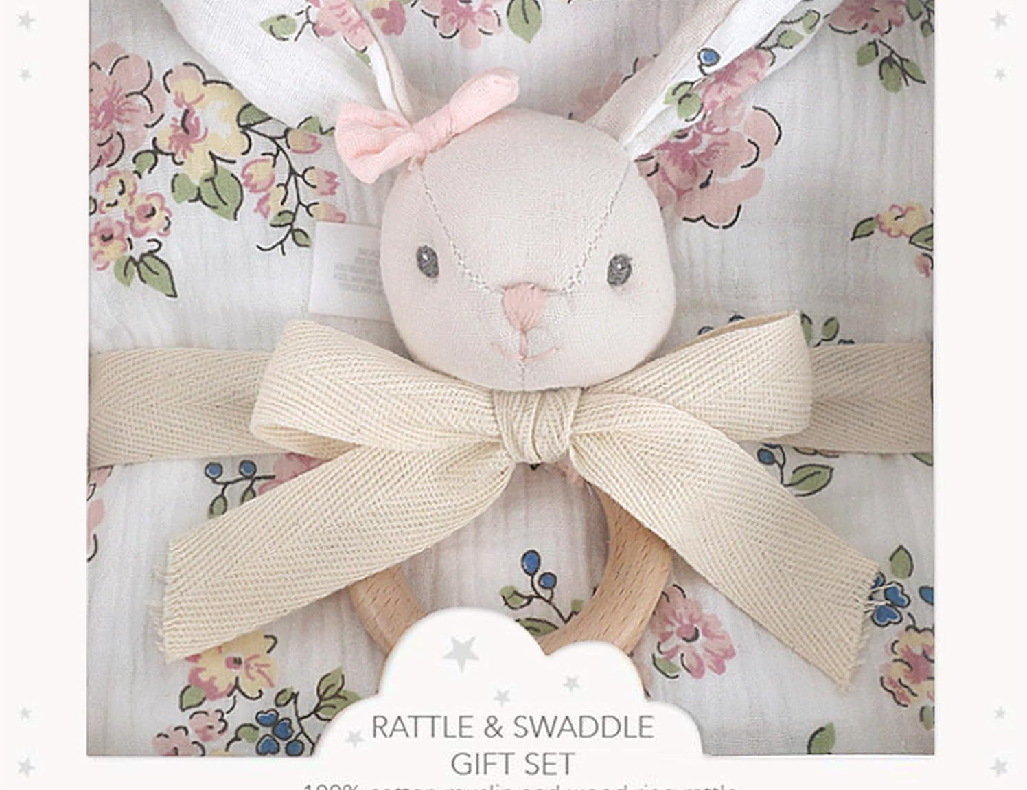 Mon Ami Muslin Swaddle & Rattle Gift Set in Parisian Floral, a bunny rattle on a floral swaddle in a gift box