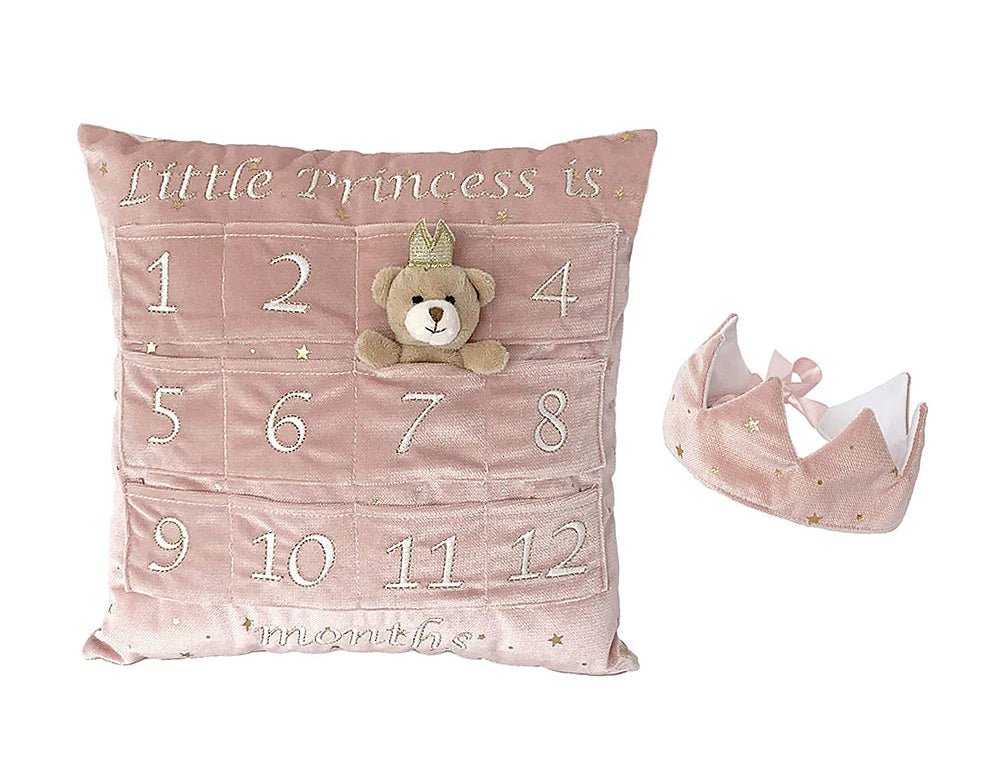 Mon Ami My First Year Advent Pillow & Gift Set in Princess, a pink velvet milestone pillow with a bear and crown