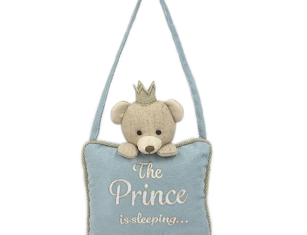 Mon Ami Plush Door Hanger in The Prince, a blue pillow with a bear reading The Prince is sleeping