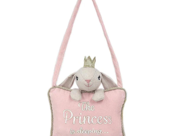 Mon Ami Plush Door Hanger in The Princess, a pink pillow with a bunny reading The Princess is sleeping