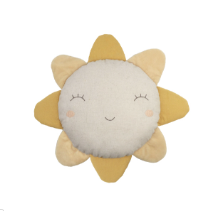 Mon Ami Sunny Day Pillow, a cream sun-shaped pillow with mustard rays and a sleeping face