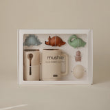 Mushie Bath Essentials Kit in Dino, boxed set shown on a cream background