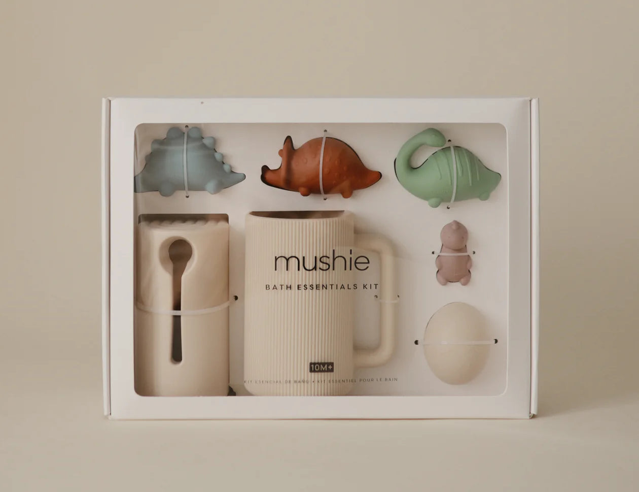 Mushie Bath Essentials Kit in Dino, boxed set shown on a cream background