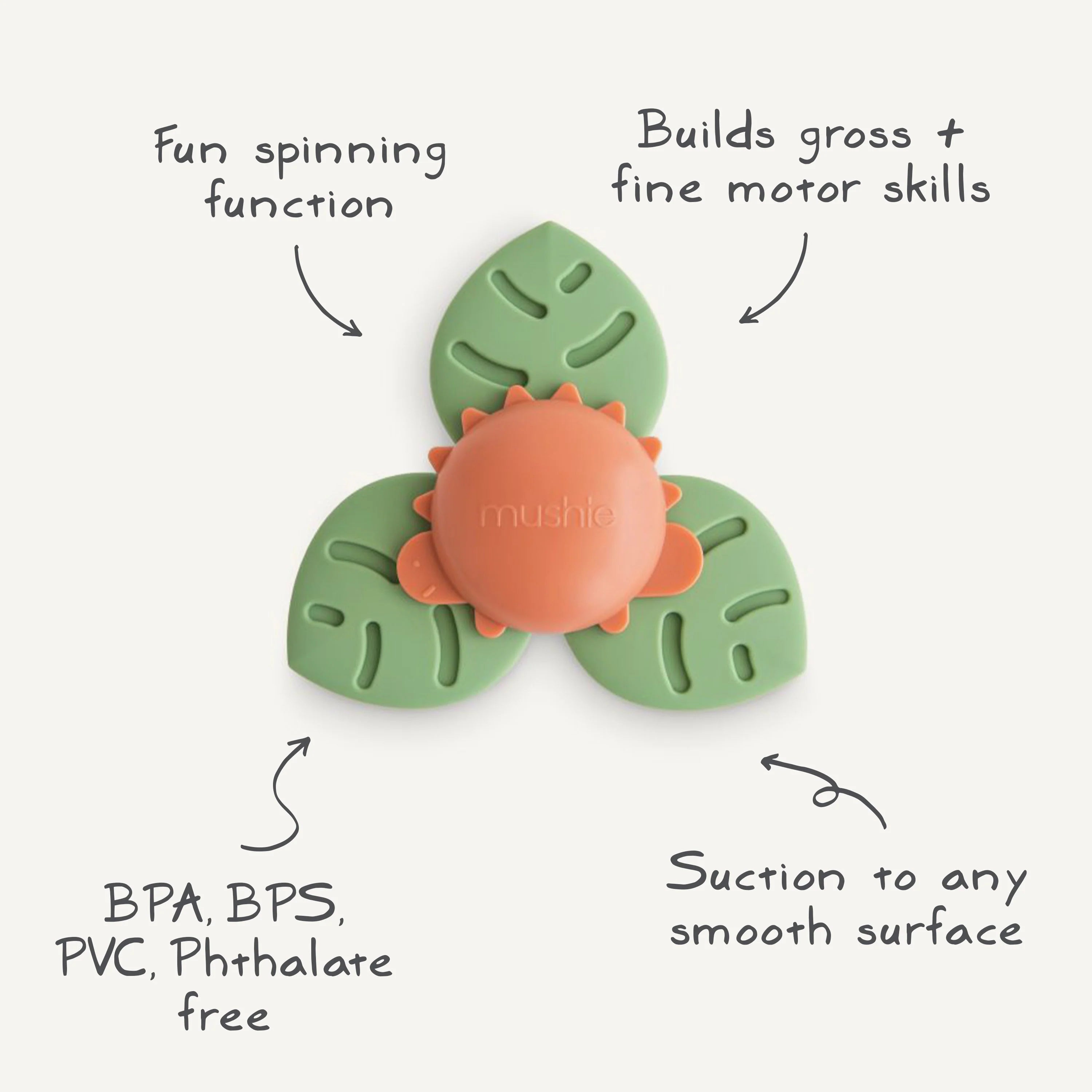 Mushie Dino Suction Spinner Toy with feature callouts: spinning function, motor skills, BPA free, suctions to smooth surfaces