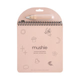 Mushie Fairies Reusable Water Color Pad, a pink spiral pad with a water brush pen and fairy illustrations