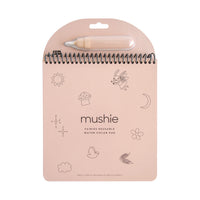 Mushie Fairies Reusable Water Color Pad, a pink spiral pad with a water brush pen and fairy illustrations