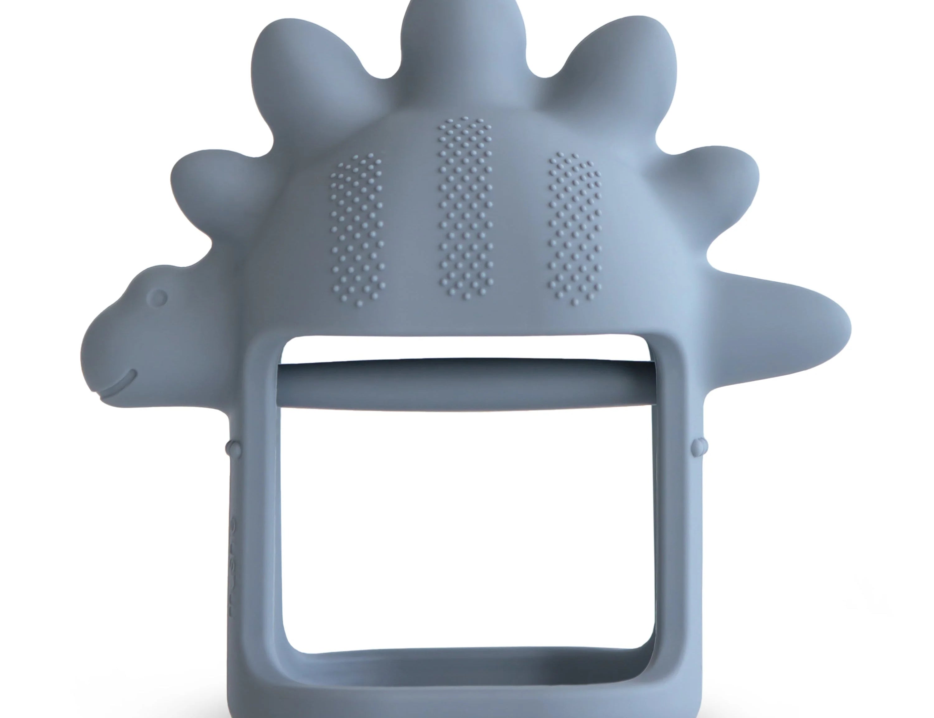 Mushie No-Drop Dino Teether, a slate blue silicone stegosaurus-shaped teether with a wrist loop
