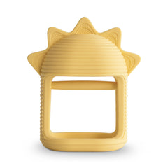 Mushie No-Drop Sun Teether, a mustard yellow silicone sun-shaped teether with a wrist loop
