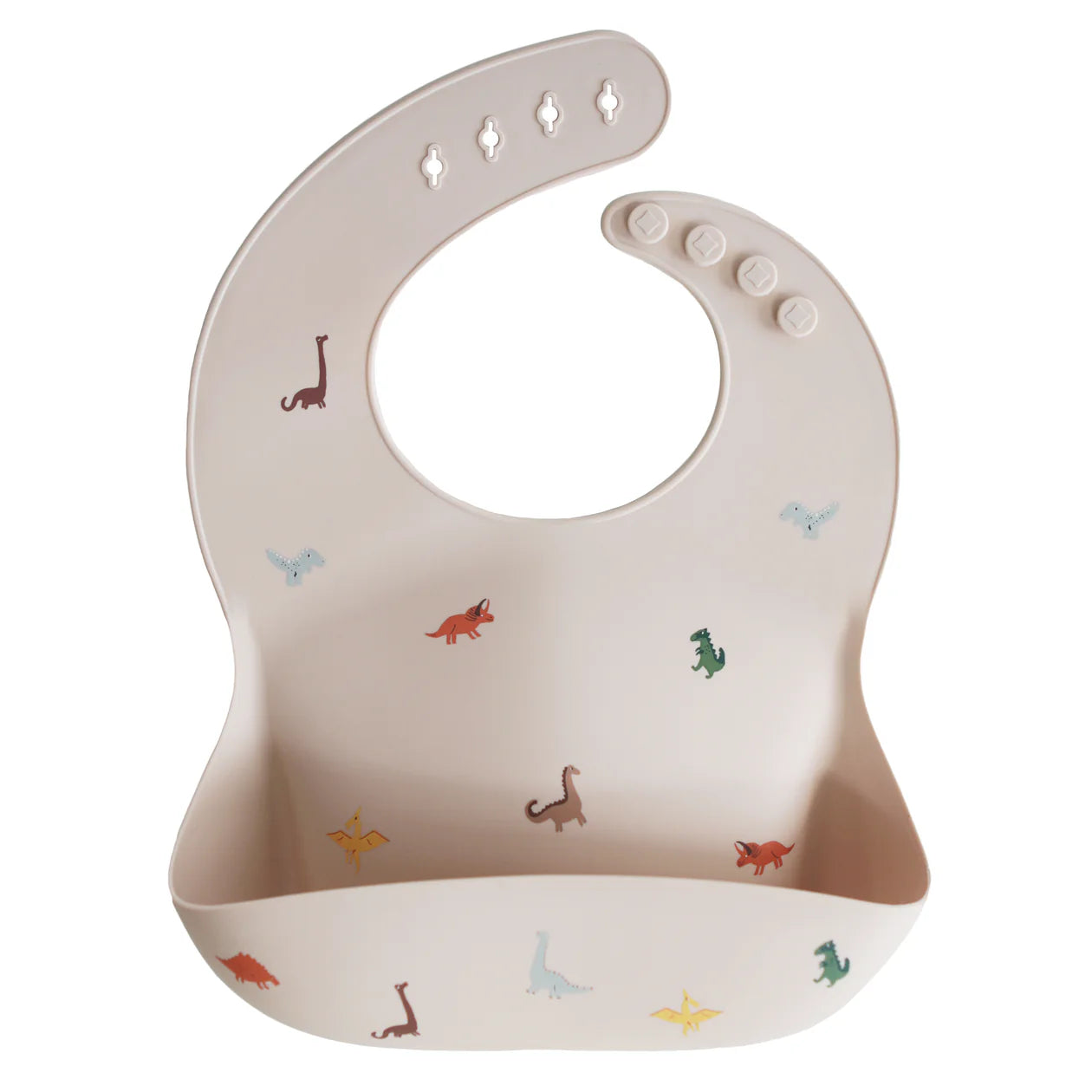 Mushie Silicone Baby Bib in Dinosaurs, a blush bib with a colorful dinosaur print and a catch pocket