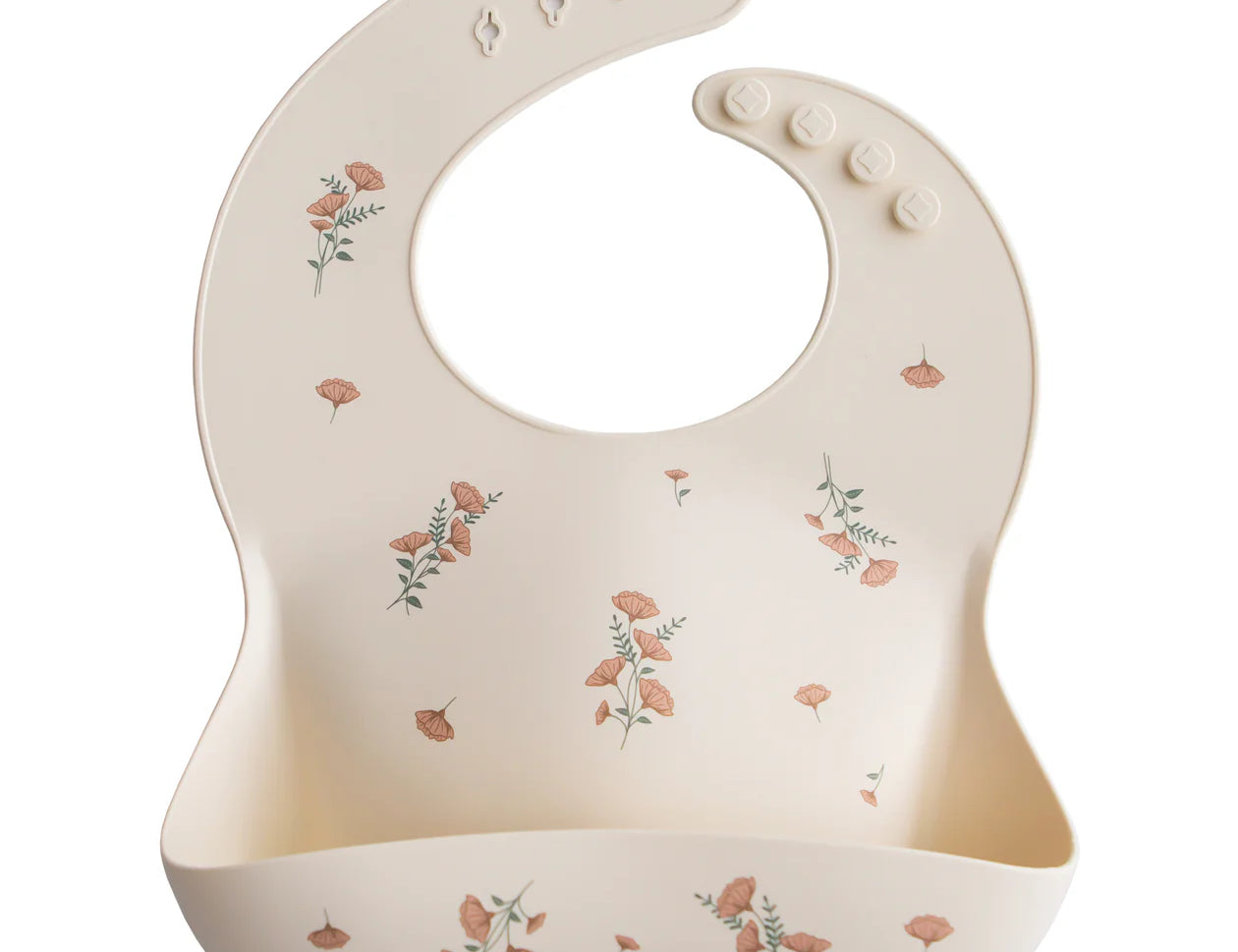 Mushie Silicone Baby Bib in Pink Flowers, a cream bib with a pink floral print and a catch pocket