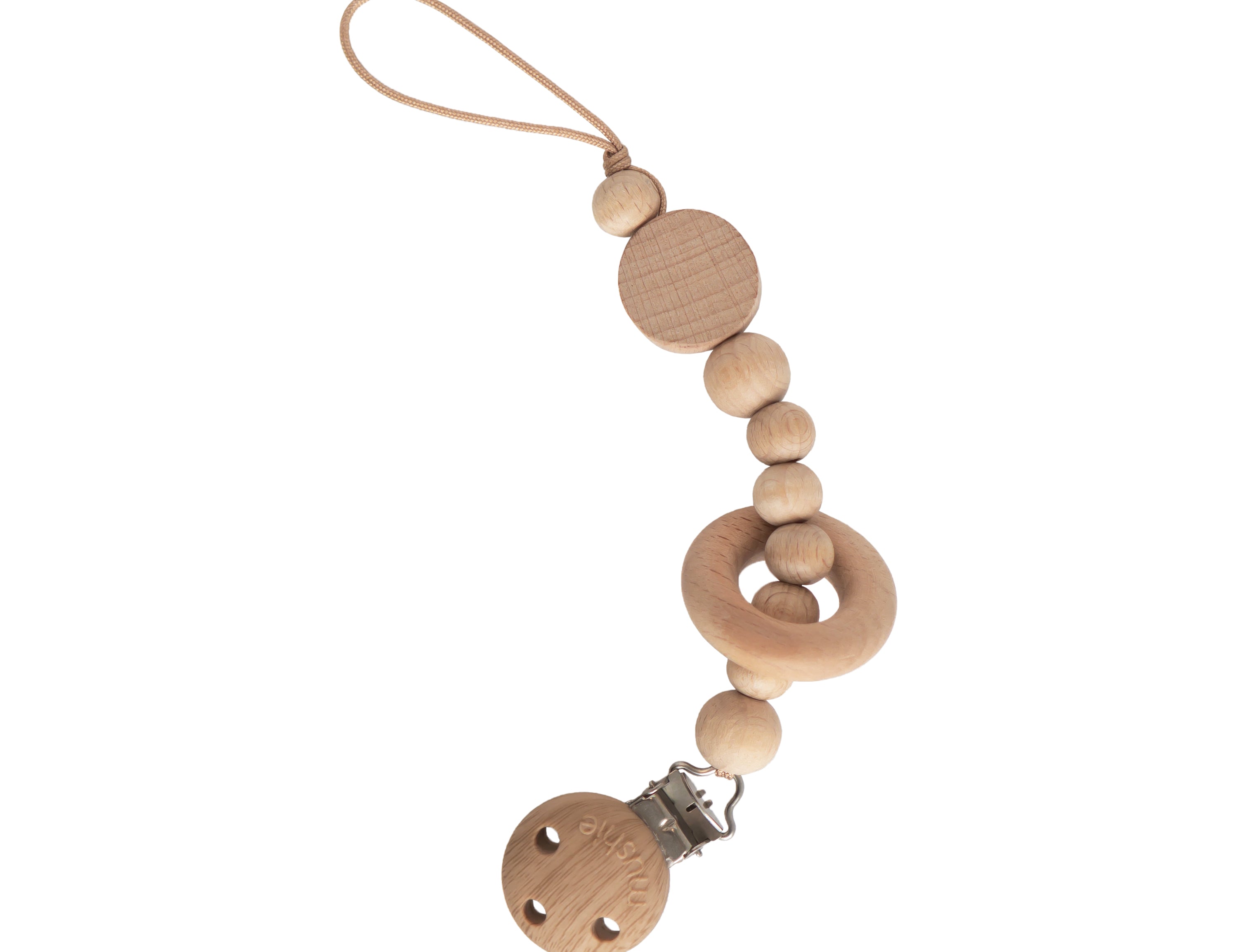 Mushie Silicone Pacifier Clip in Mila, natural wood beads and a ring on a tan strap with a wooden clip