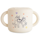 Mushie Snack Cup in Bluey Ivory, a cream silicone cup printed with Bluey and Bingo