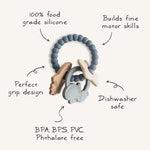 Mushie Space Teething Ring with feature callouts: food grade silicone, grip design, fine motor skills, dishwasher safe