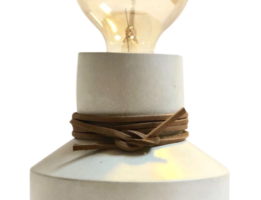 Natural by Hagelsieb Concrete Lamp, close-up of the gray concrete base with a leather cord wrap and Edison bulb