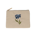 Night Bloom flat pouch, a cream ribbed corduroy pouch with a gold zipper and an embroidered blue flower with green leaves, on a white background.