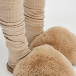 Nude Snowball Slippers in Camel, close-up of the fluffy faux fur slides