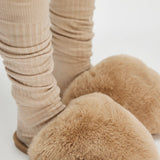 Nude Snowball Slippers in Camel, close-up of the fluffy faux fur slides
