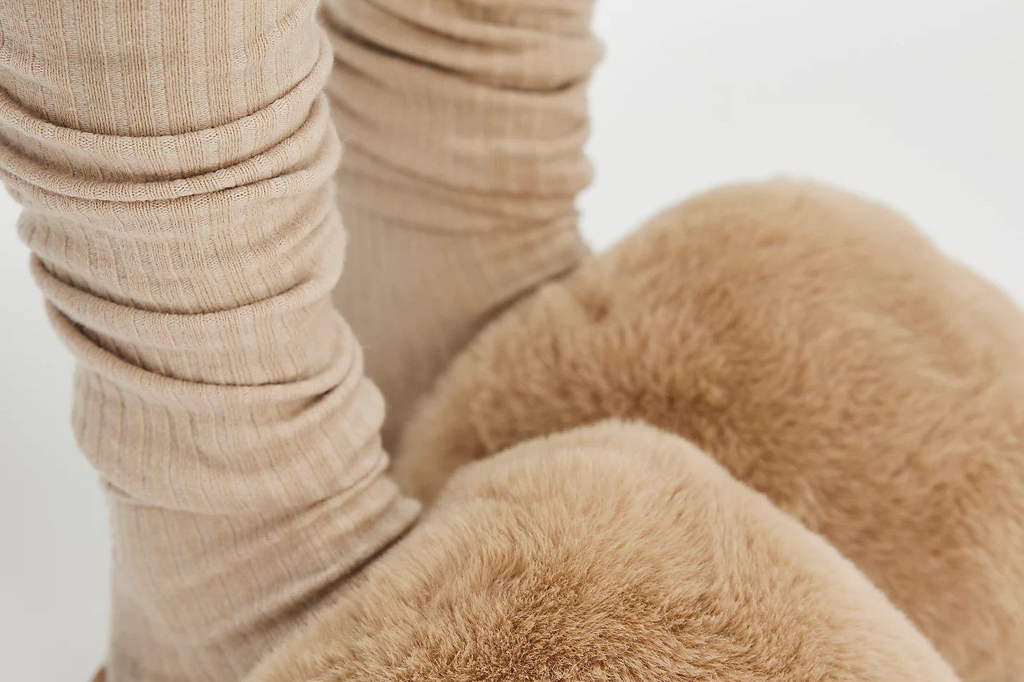 Nude Snowball Slippers in Camel, close-up of the fluffy faux fur slides