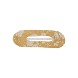 Oval lay flat acrylic claw clip in Canyon Rose, classic size, a hair claw clip printed with white roses and daisies on a warm clay rose ground, on a white background.